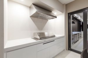 Outdoor kitchens with custom made BBQ cabinet