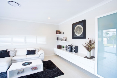modern cabinet with push to open drawers in living room