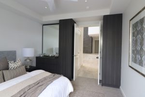 custom cabinet with drawers and tall doors