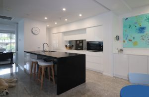 Modern Kitchen built in the center of Surfers Paradise with Sharknose handles