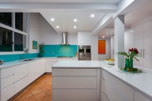 Modern kitchen installed by Cuisine - 2pac cabinet doors - pure white stone benchtops - glass splashback - undermount sink - new appliances